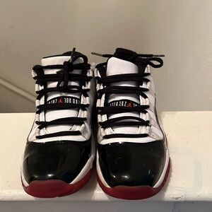 Black white and red Jordan’s kids size 5.5Y